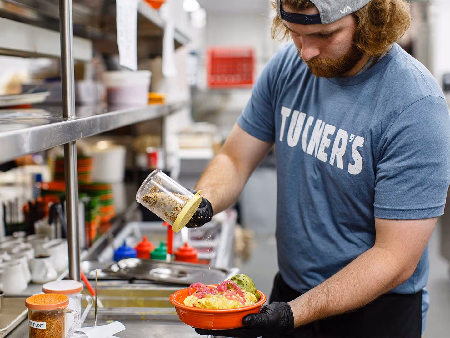 Cook preparing dish