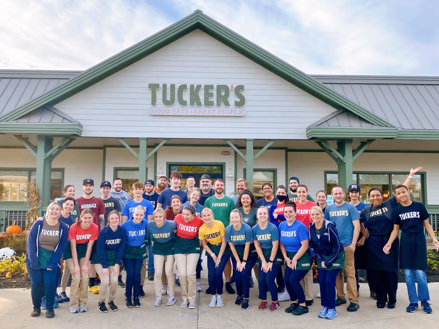 Tucker's team in front of Bedford restaurant