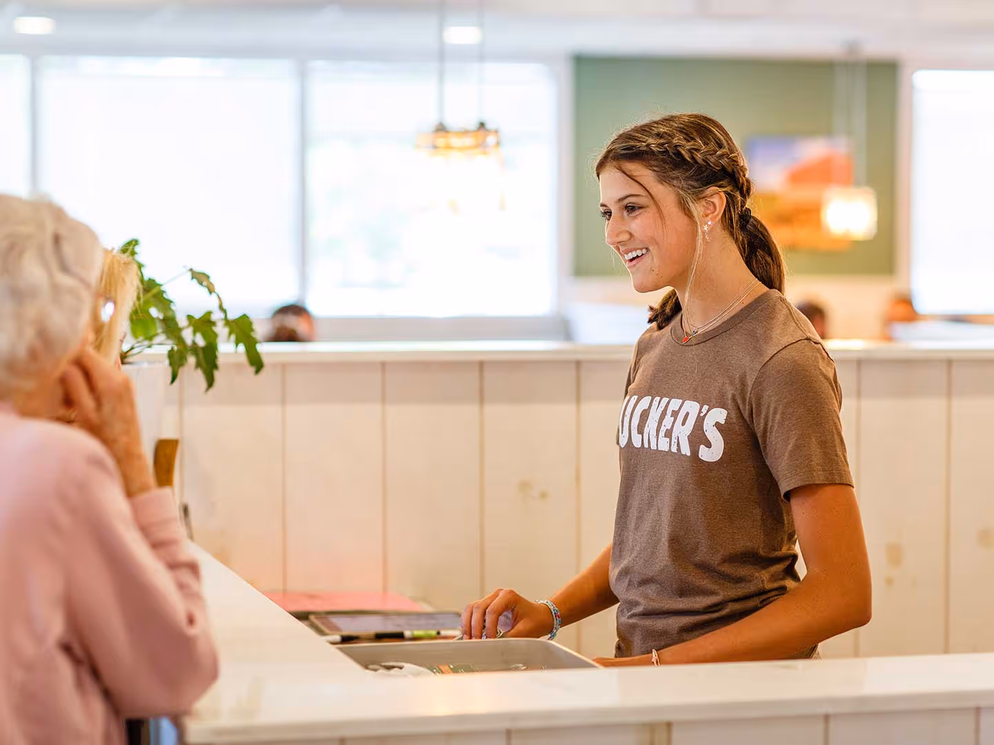 Hostess welcoming guests