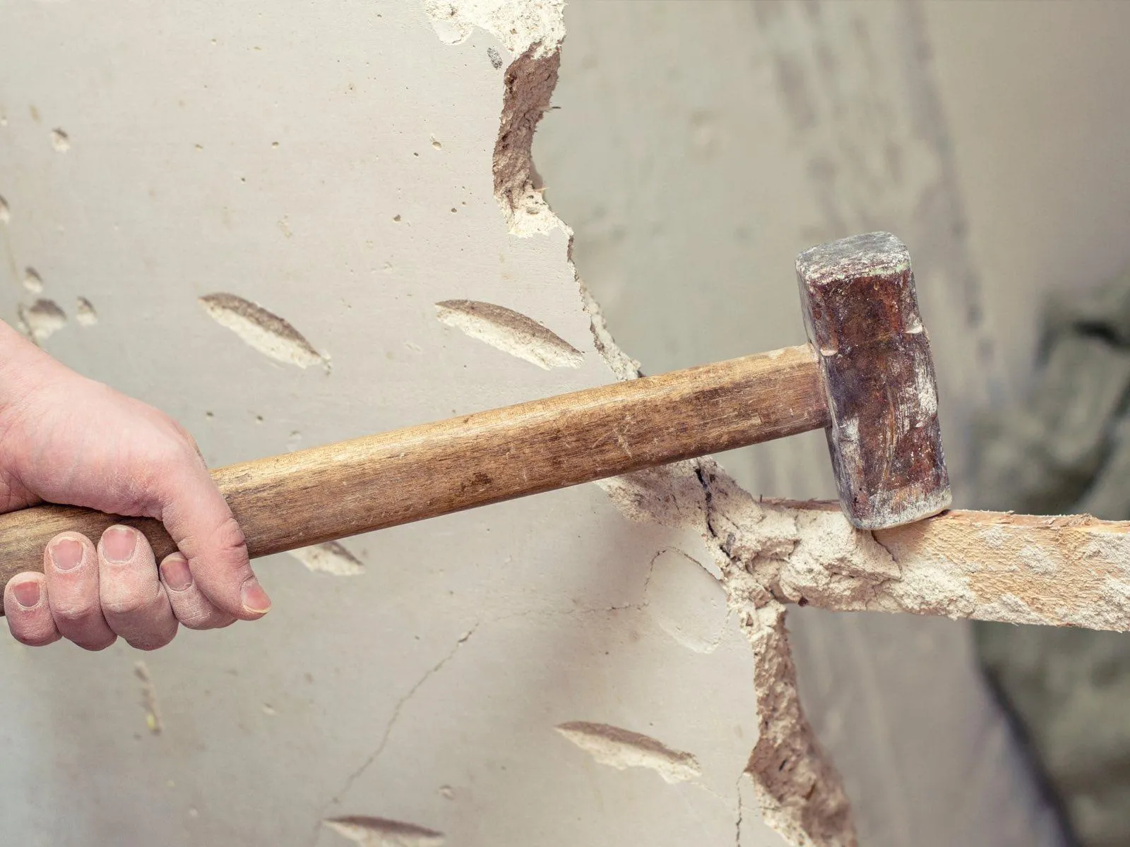 demolishes walls