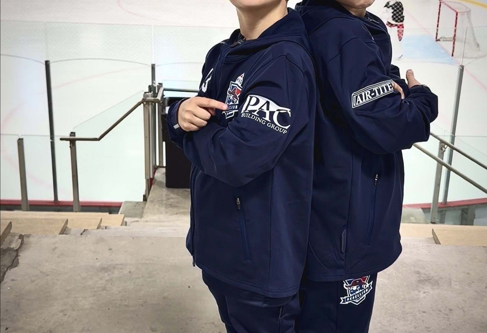 PAC Building Group logo on the sleeve of a U8 King Rebellion team jacket