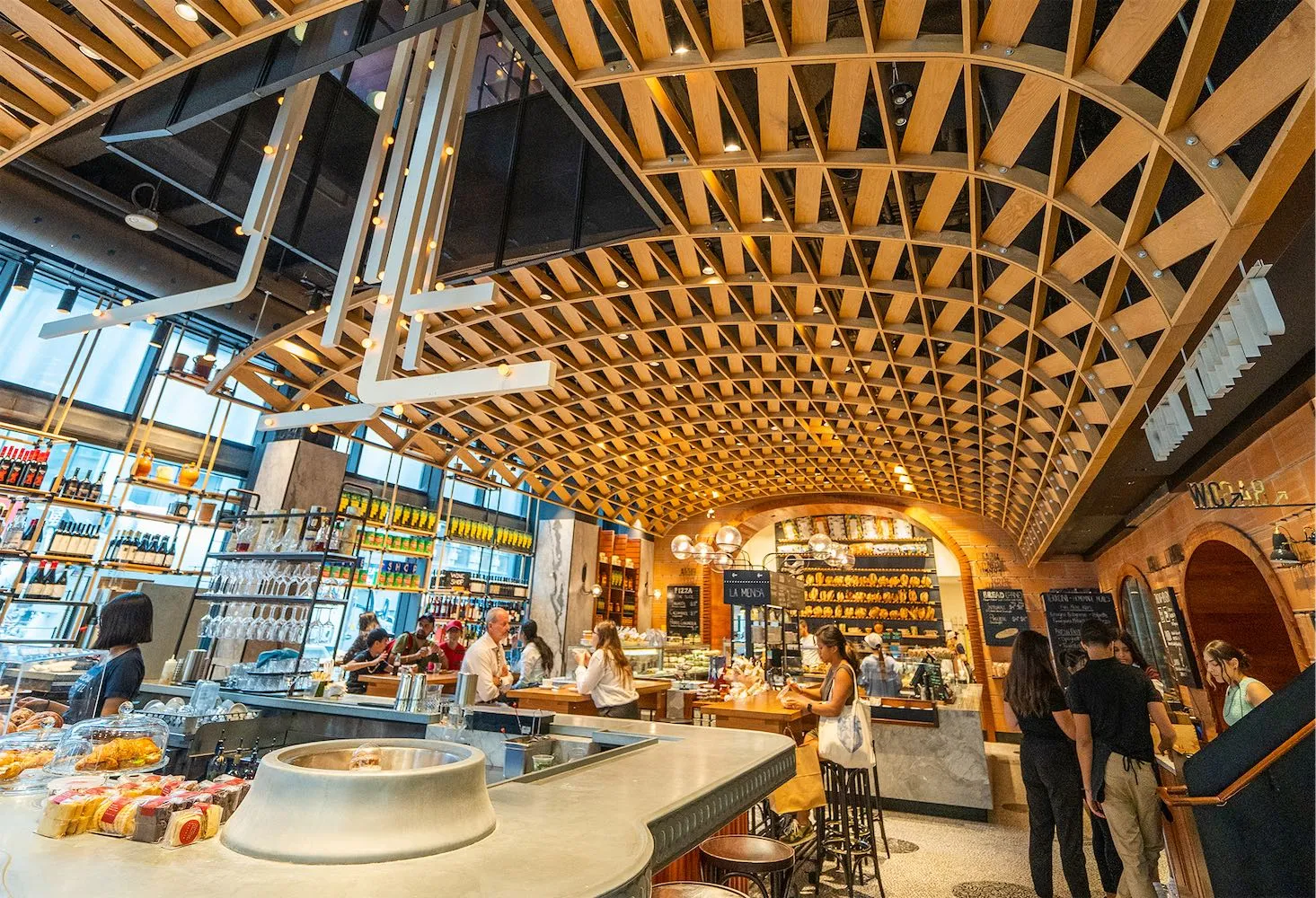 Sud Forno Temperance's heritage building exterior amid Toronto's financial district skyline