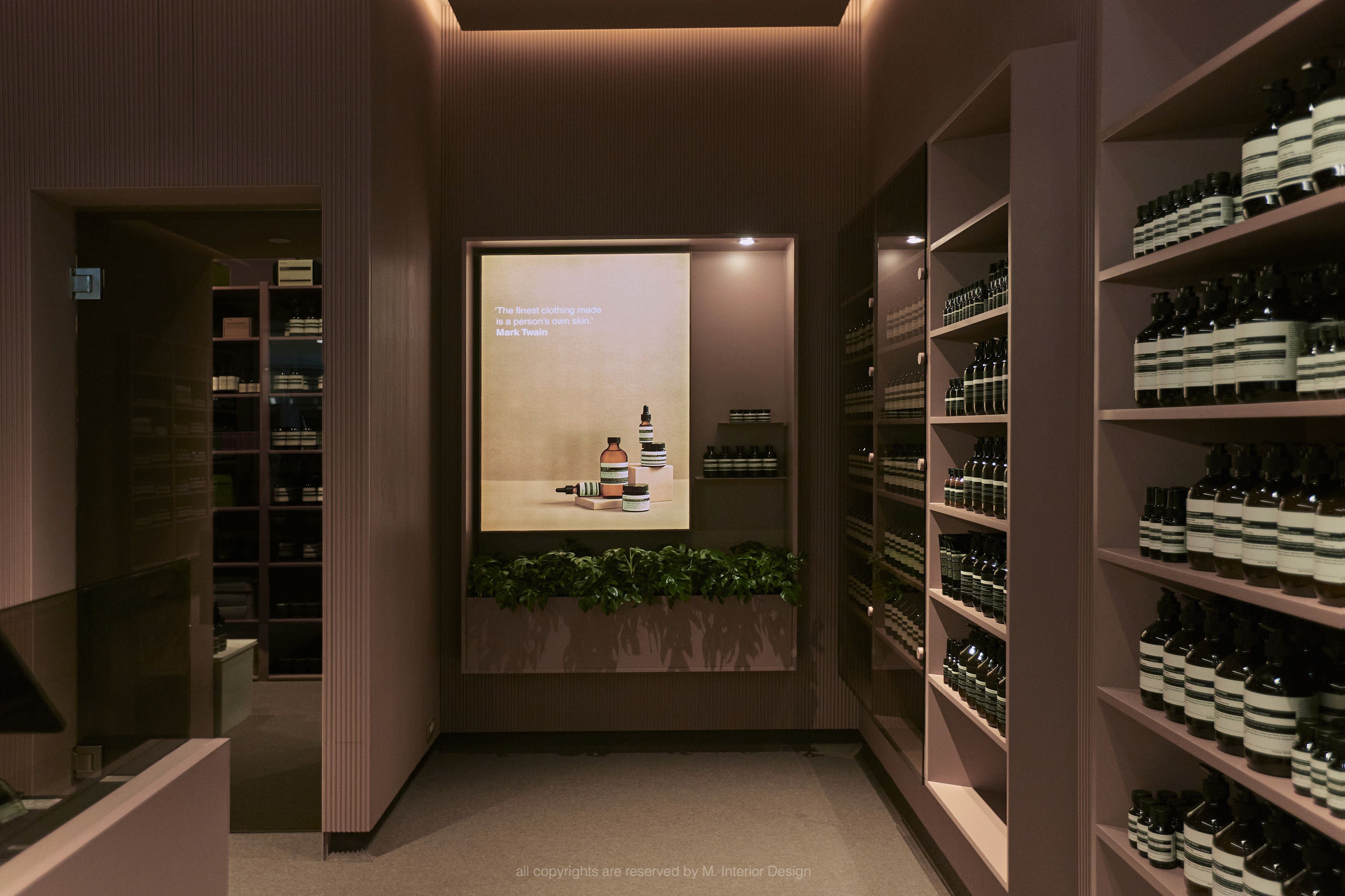 Aēsop Taipei 101 retail interior design with minimalist display shelves and white walls, created by M Interior, a leading design and construction firm in Taipei.