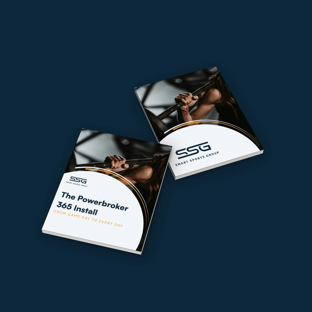 Printed PowerBroker 365 workbooks showing the front and back covers
