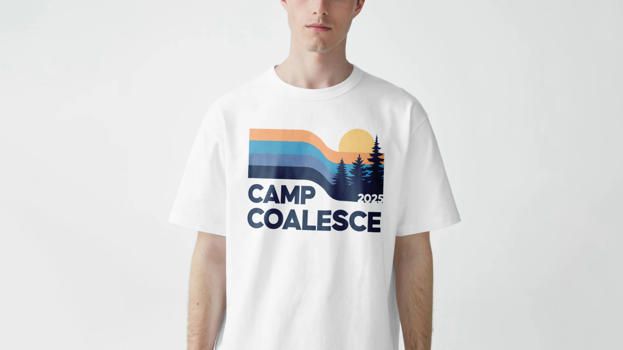 Camp Coalesce event T-shirt with illustrated logo and cabin scene.