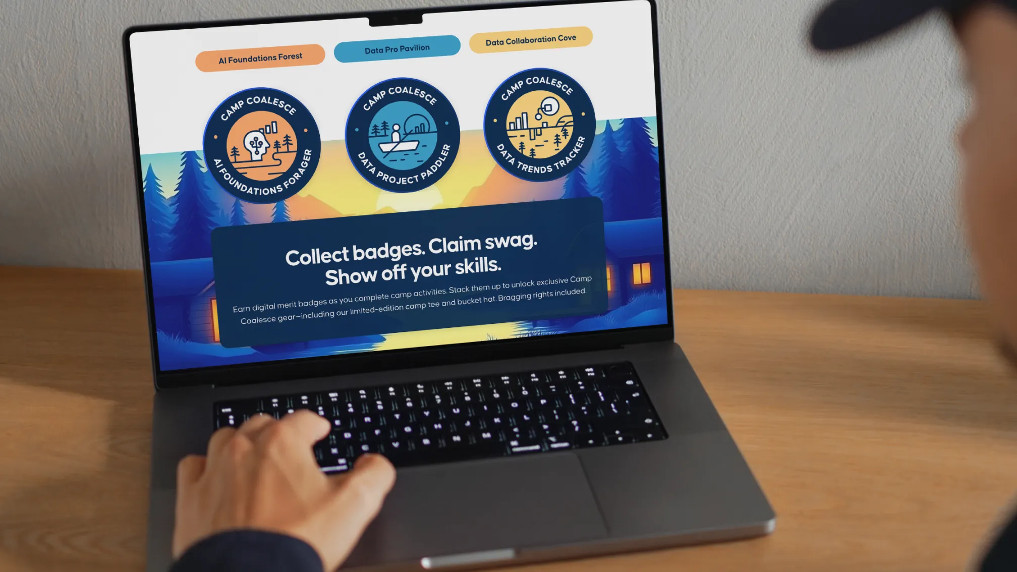 Camp Coalesce promotional page displayed on a laptop screen with event highlights.