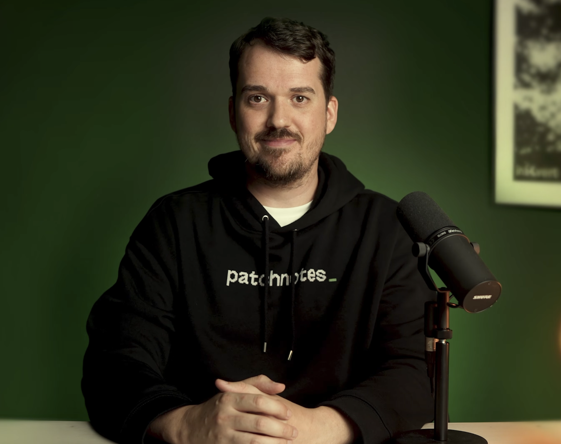 Videodeck spokesperson on a dark green set