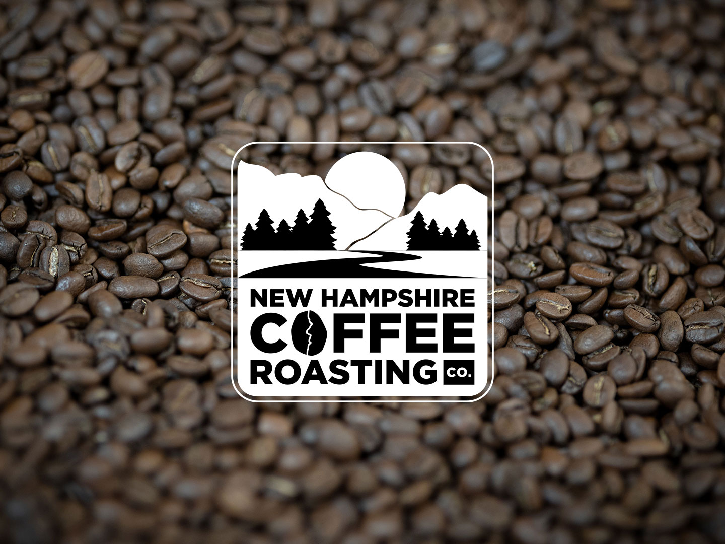 New Hampshire Coffee Roasting Co. logo overlaid on a background of roasted coffee beans.
