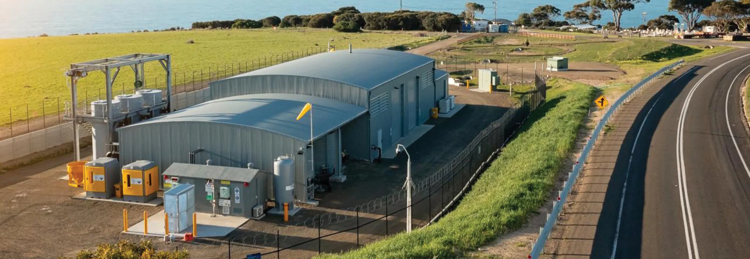 Aerial view of a GO-built water treatment facility on the coast