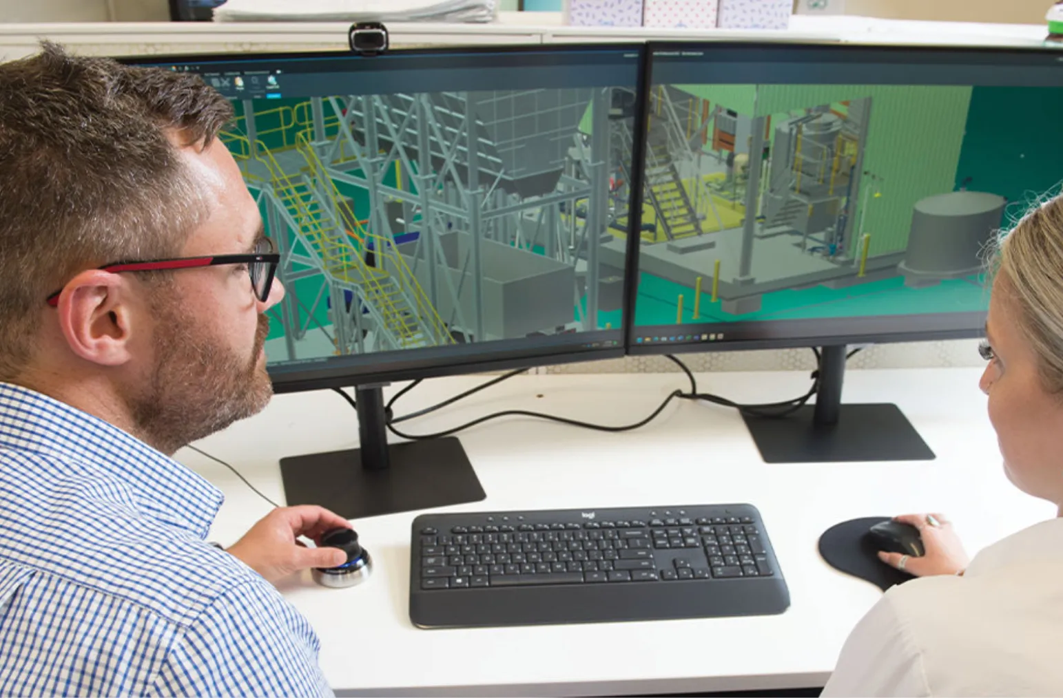 GO designers reviewing a 3D model of water infrastructure