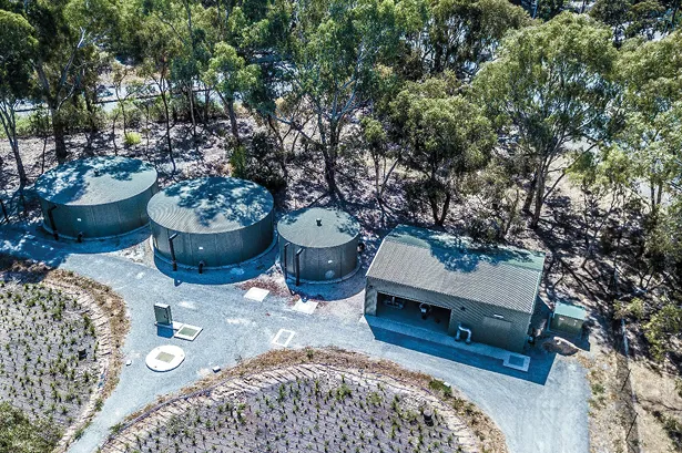 Aerial view of storage tanks and treatment building for Waterproofing Eastern Adelaide