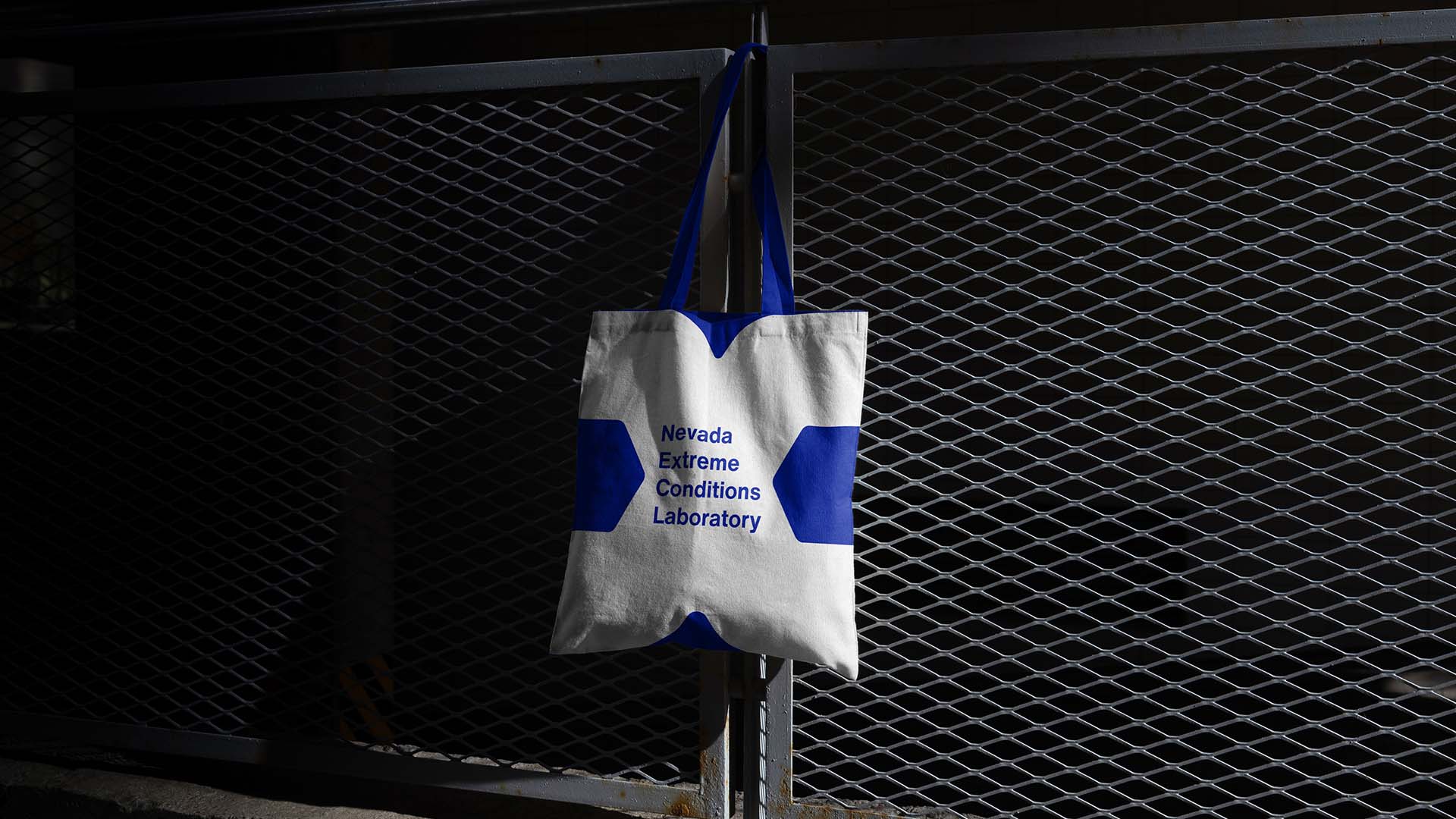 NEXCL logo on a tote bag