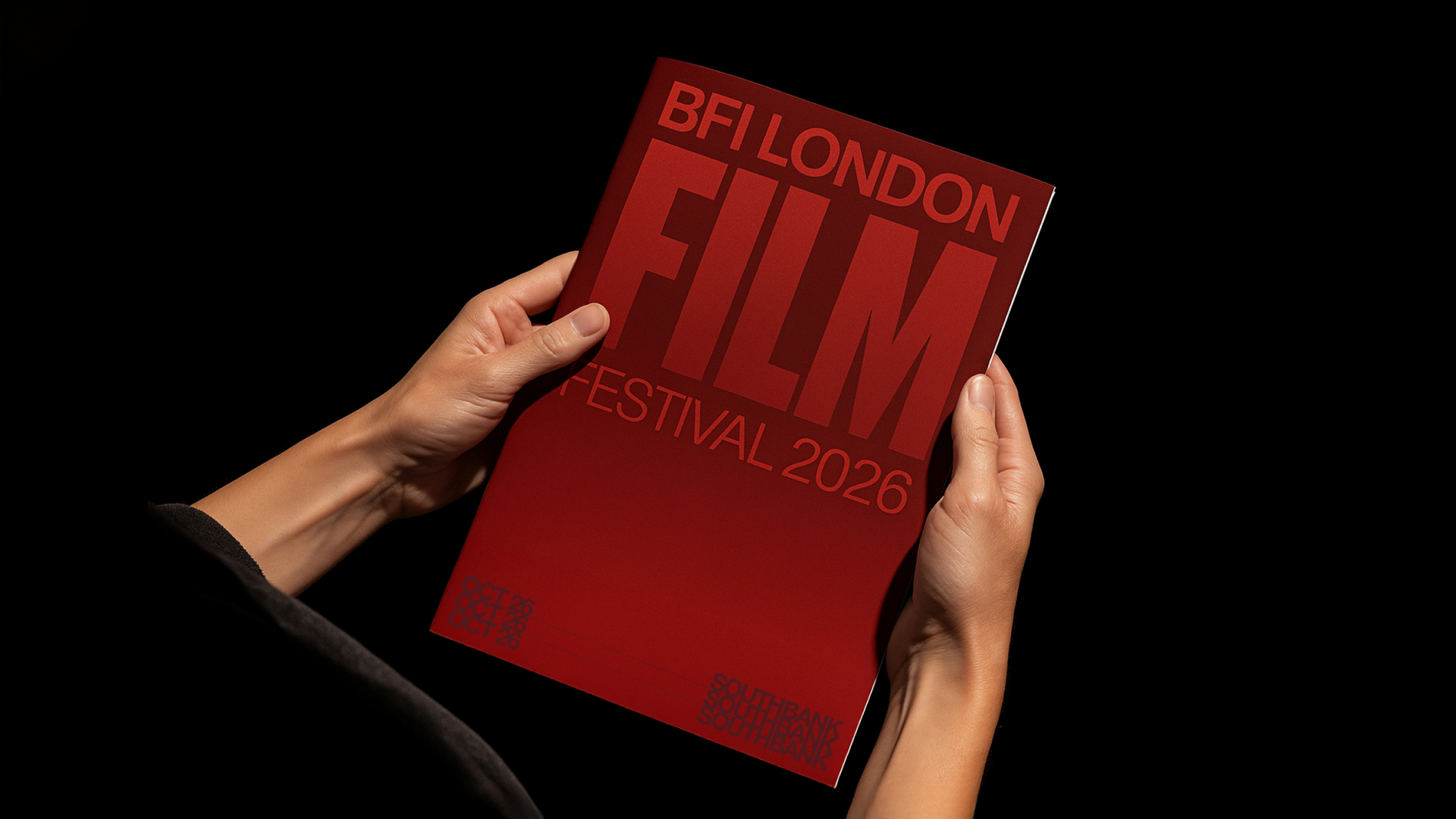 Hands holding a red booklet with bold text: BFI London Film Festival 2026, Southbank, Oct 26.