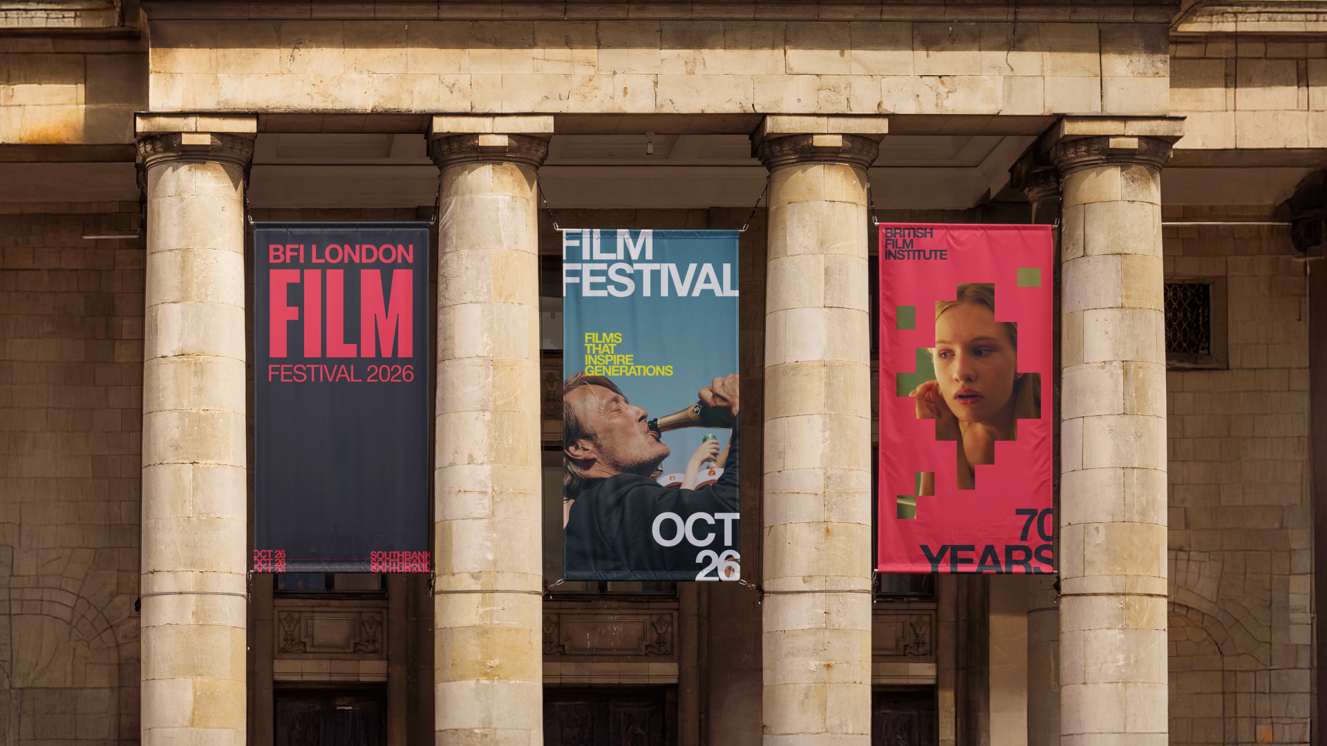 Three banners for BFI London Film Festival 2026 hanging between stone columns of a classical building.