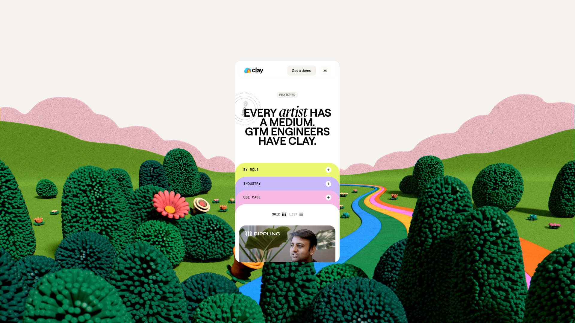 Digital clay landscape with green bushes, pink flowers, and a colorful river behind a mobile app screen.