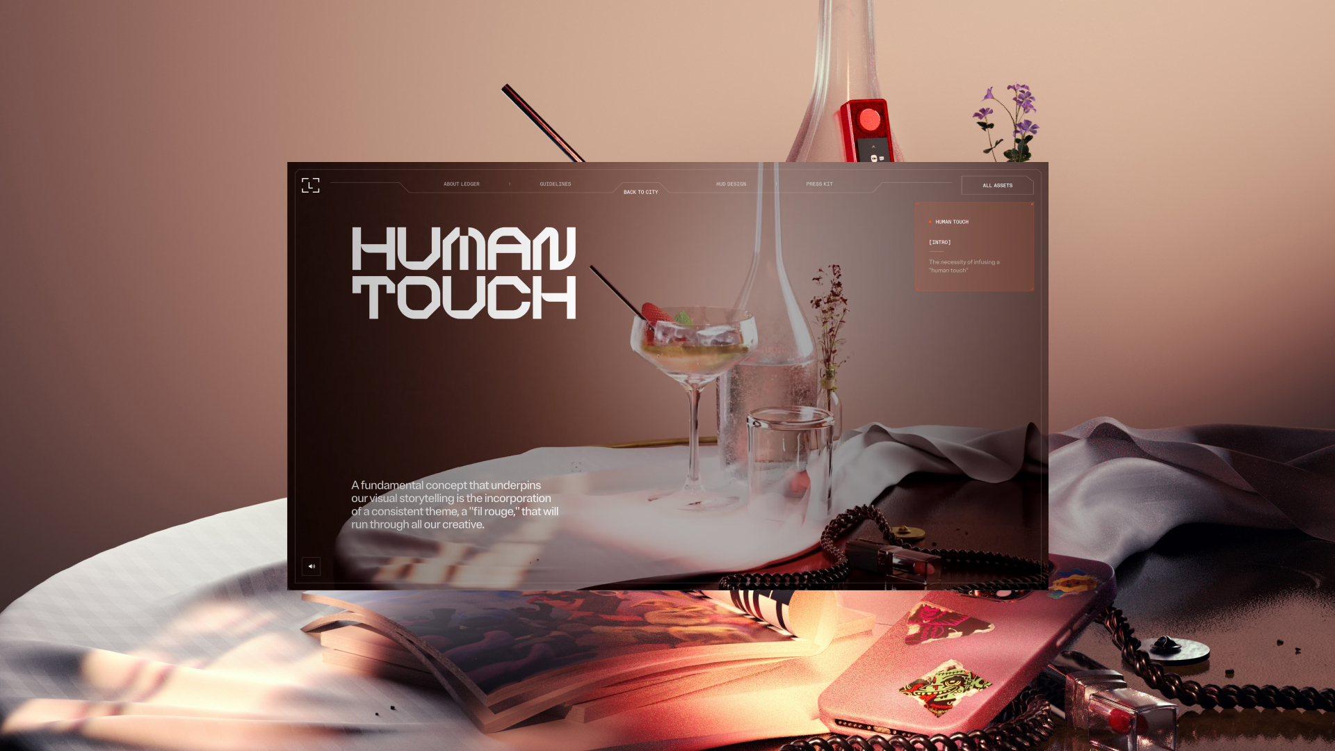 Website page titled 'Human Touch' showing a cocktail glass, a bottle, and a rose on a draped cloth.