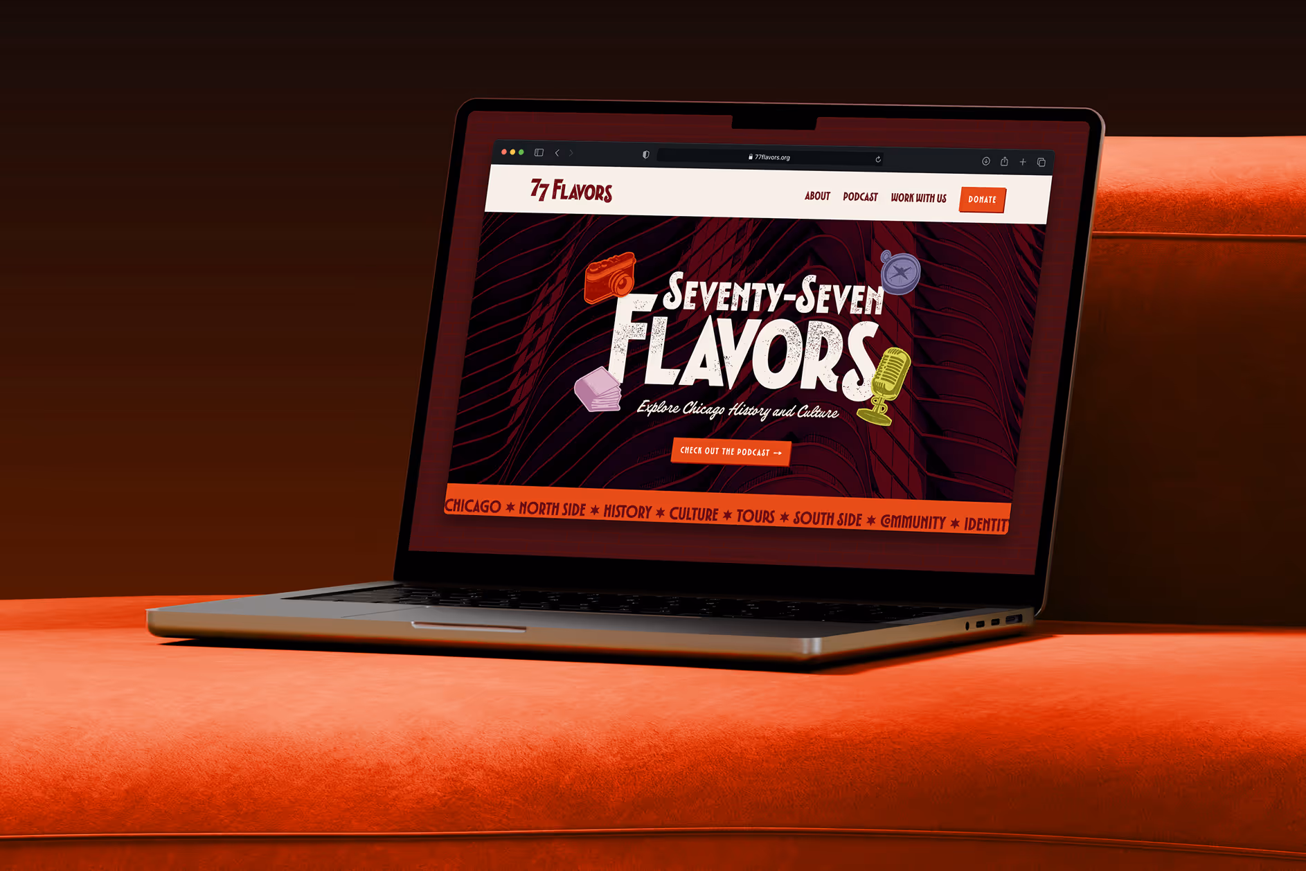 Mockup of the 77 Flavors home page displayed in the Safari browser on a MacBook that sits on an orange velvet sofa.