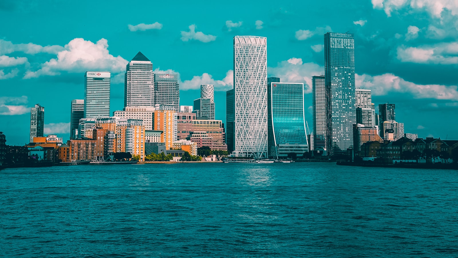 Canary Wharf commercial towers across the water, London