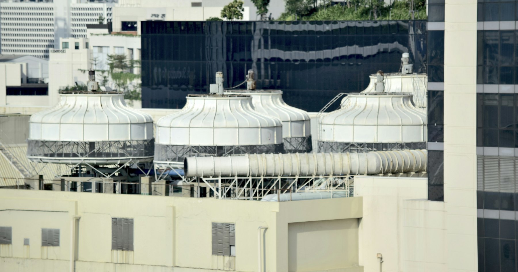 Cooling towers and chiller plant on the roof of a commercial building