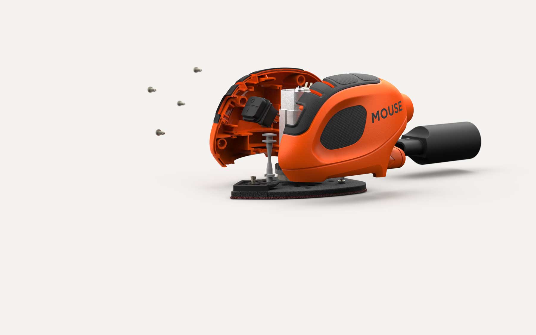 Orange and black handheld power tool labeled MOUSE with its outer casing partially removed and screws floating nearby.