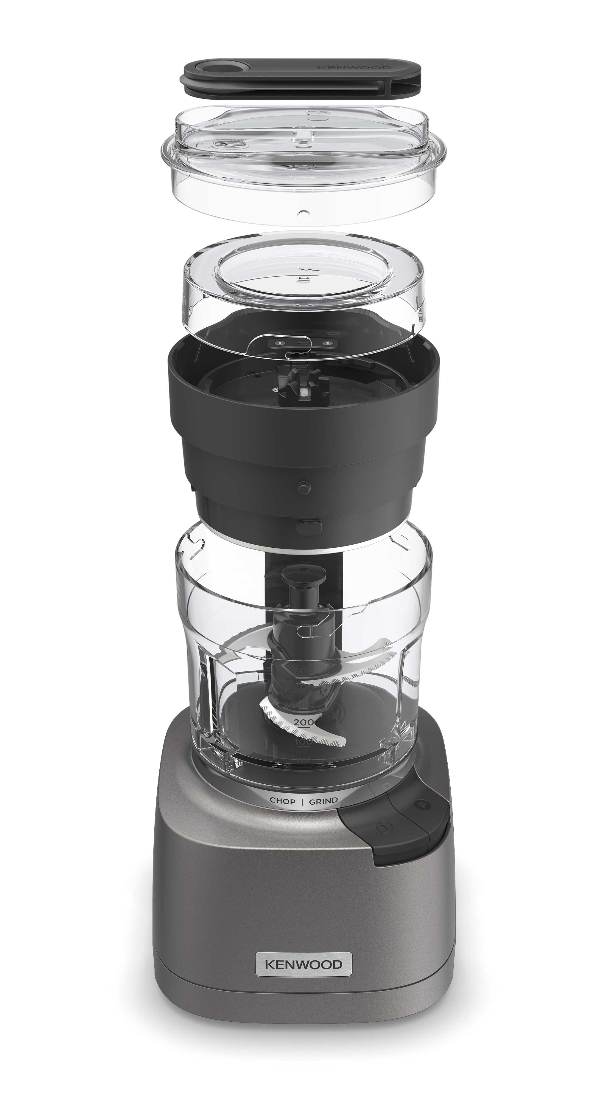 Kenwood countertop food chopper and grinder with transparent bowl, sharp curved blades, and multiple detachable lids displayed in exploded view.