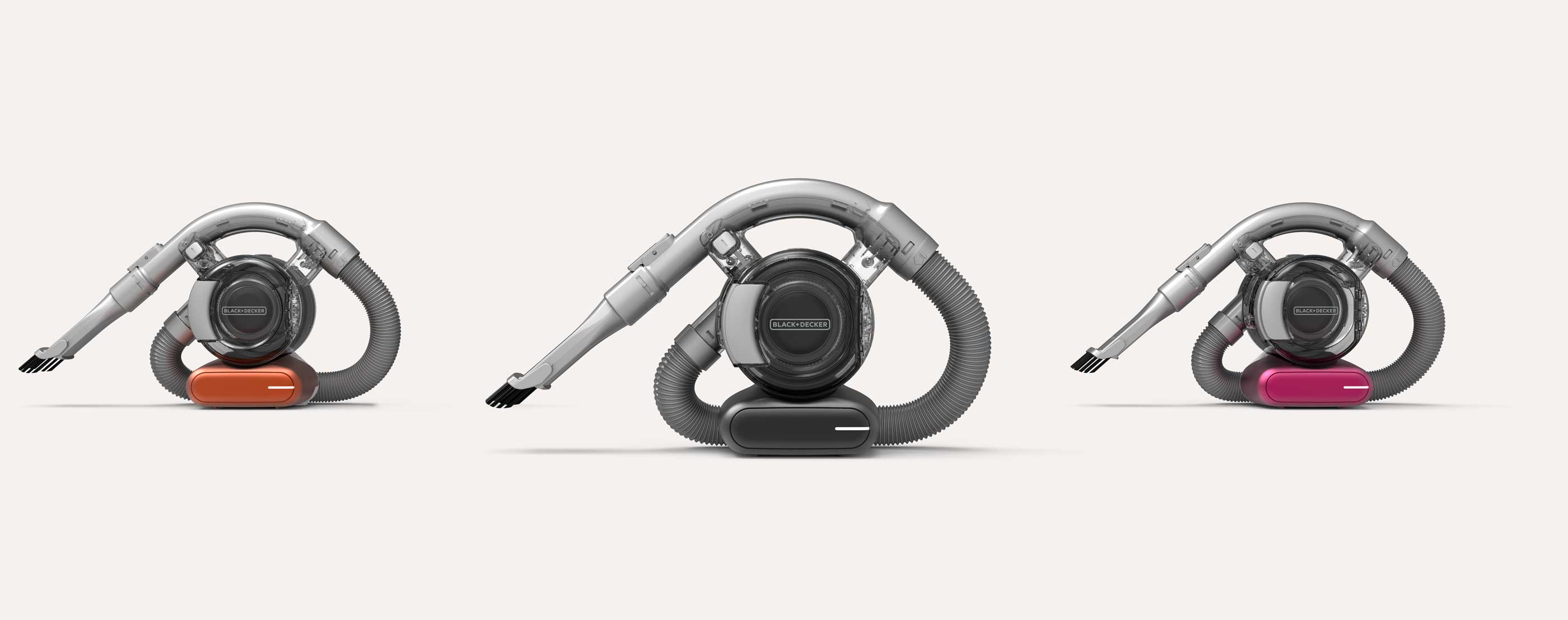 Three Black+Decker Flexi Dustbuster handheld vacuum cleaners lined up, each featuring a clear dust chamber, flexible hose, and colored base in orange, black, and pink on a plain light background.
