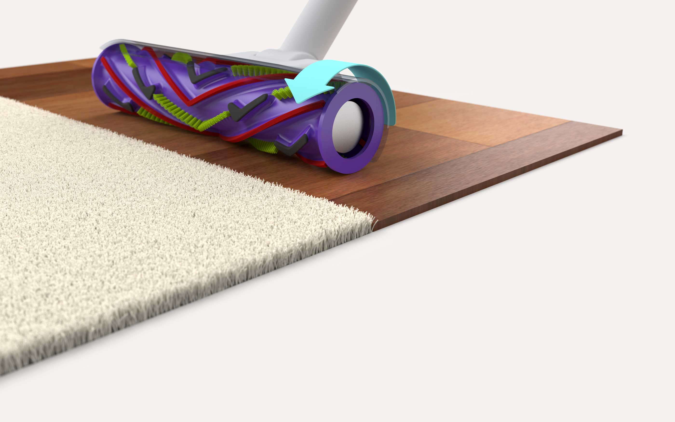 Close-up of a vacuum cleaner rotating brush head transitioning from wooden floor to cream carpet, with a blue arrow indicating the brush rotation direction.