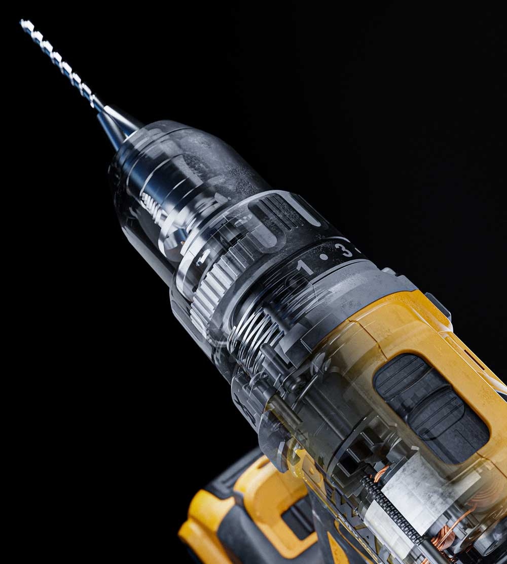 Close-up of a cordless drill with a transparent casing revealing internal components and a drill bit attached, shown against a black background.