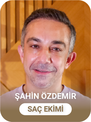 Portrait of a smiling man with short gray hair against a wooden background, labeled Şahin Özdemir and Saç Ekimi.