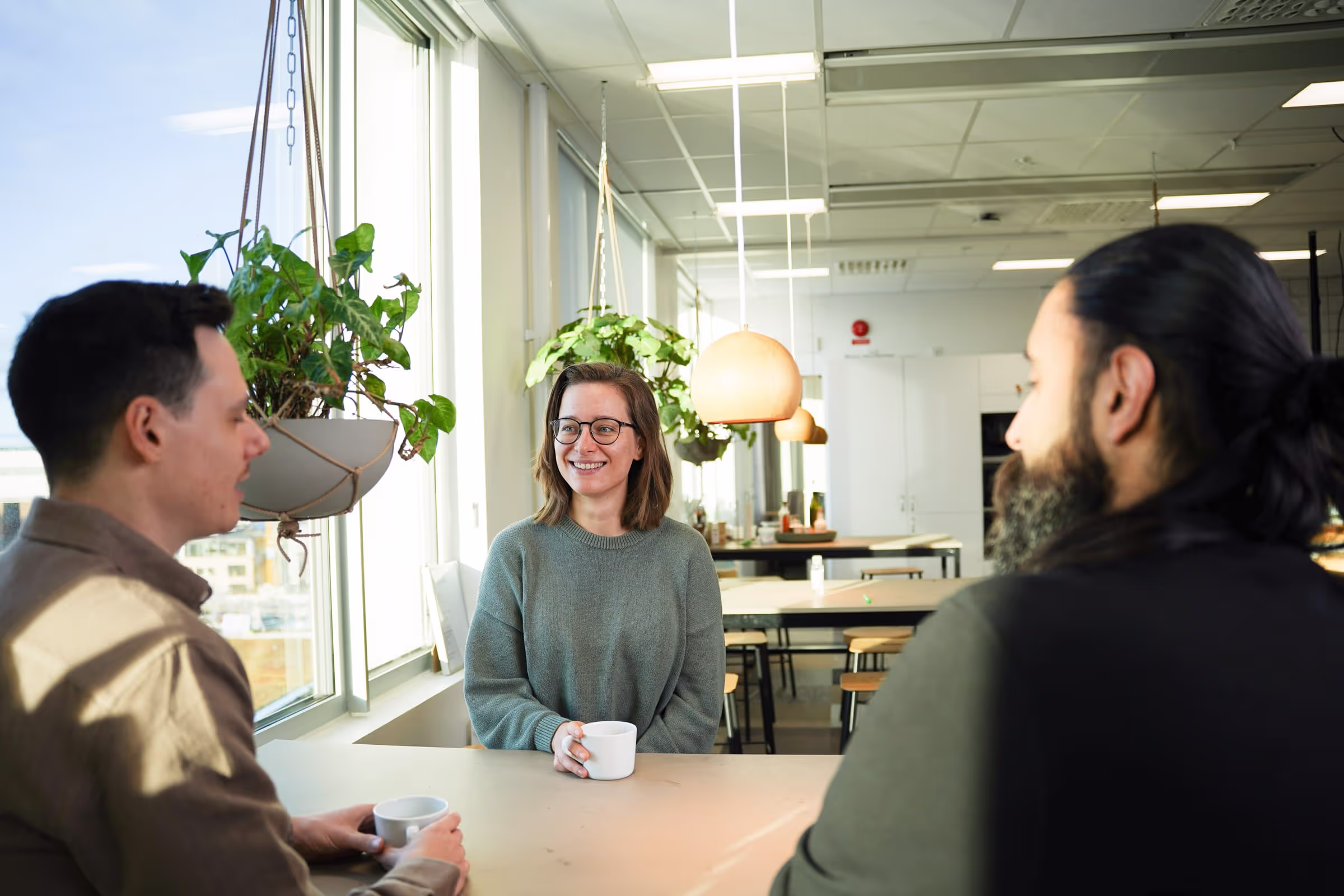 Refined employees having a casual meeting.
