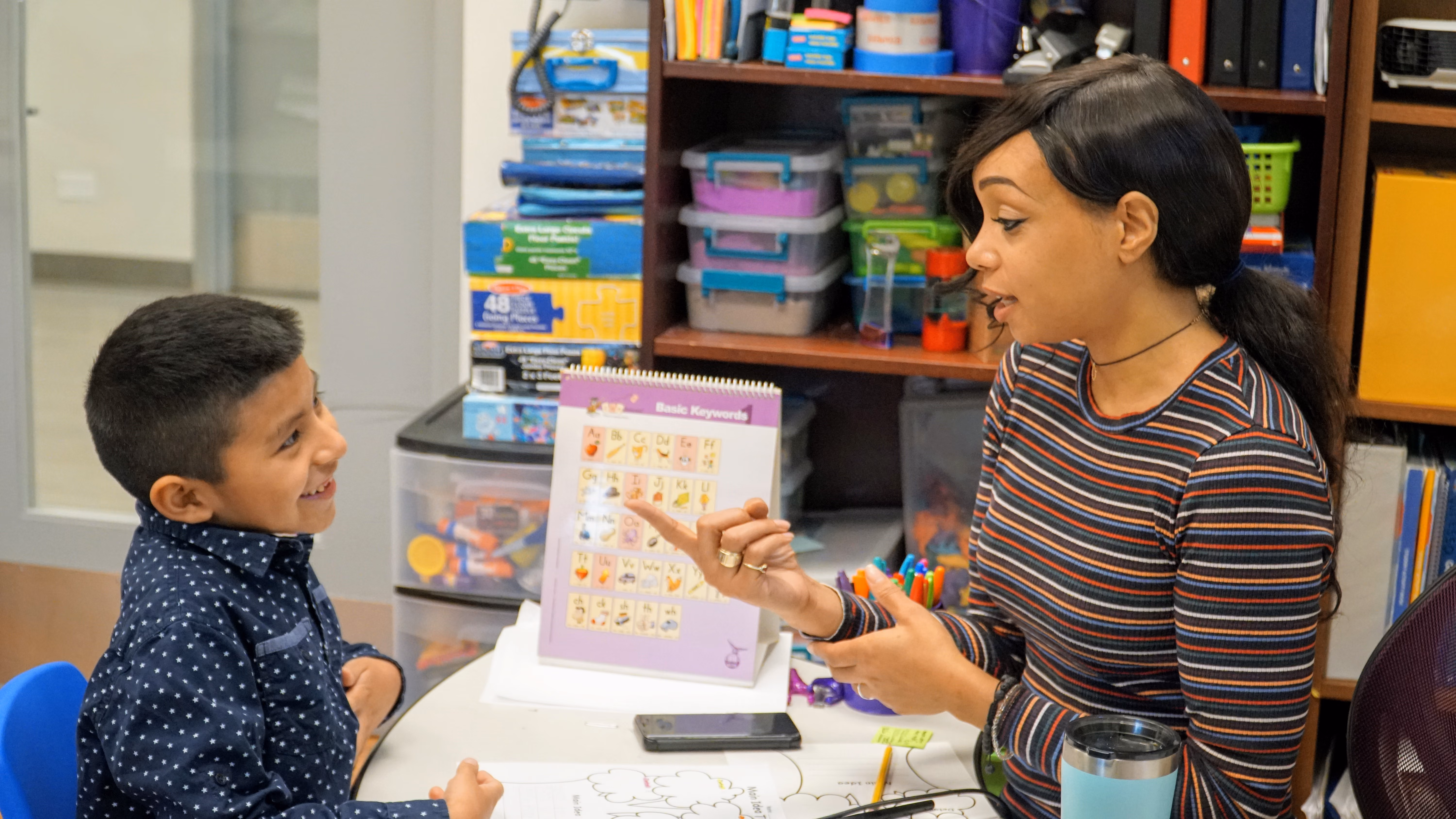 A teacher and a DCB student talking