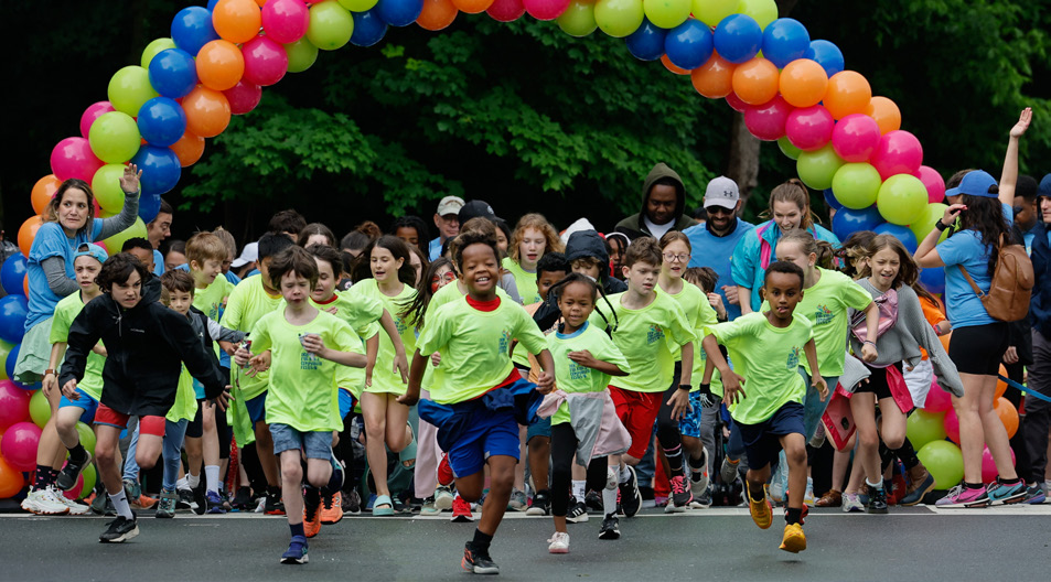 DC Bilingual students and community members participating in the school Fun Run.