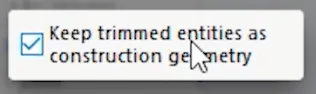 When trimming sketch entities in SolidWorks, you can optionally turn the trimmed entities into construction geometry