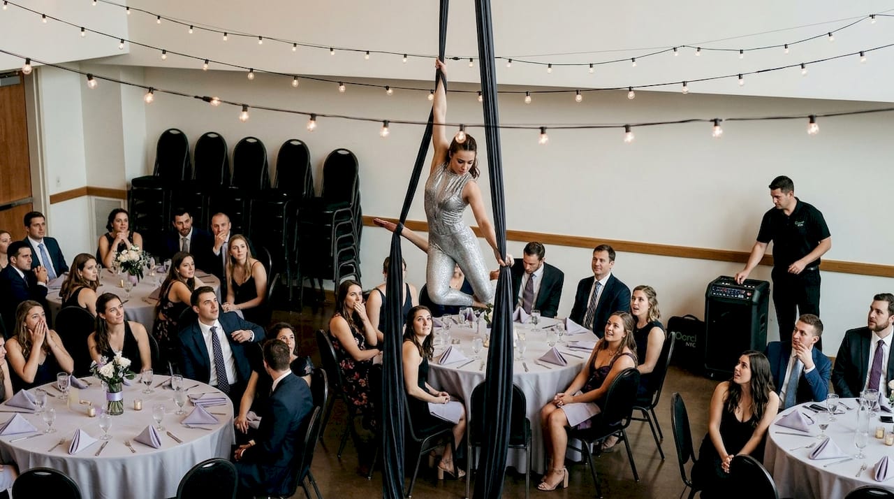 Aerialist performing at interactive party event