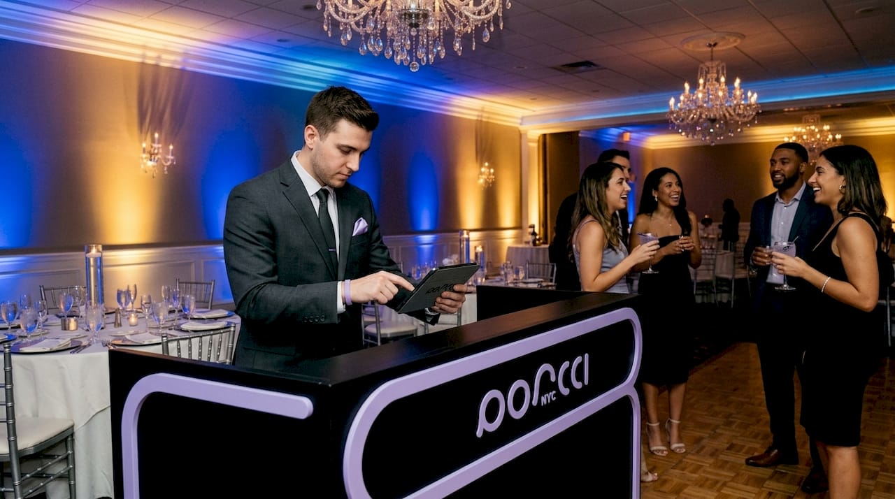 DJ programs wedding uplighting with tablet