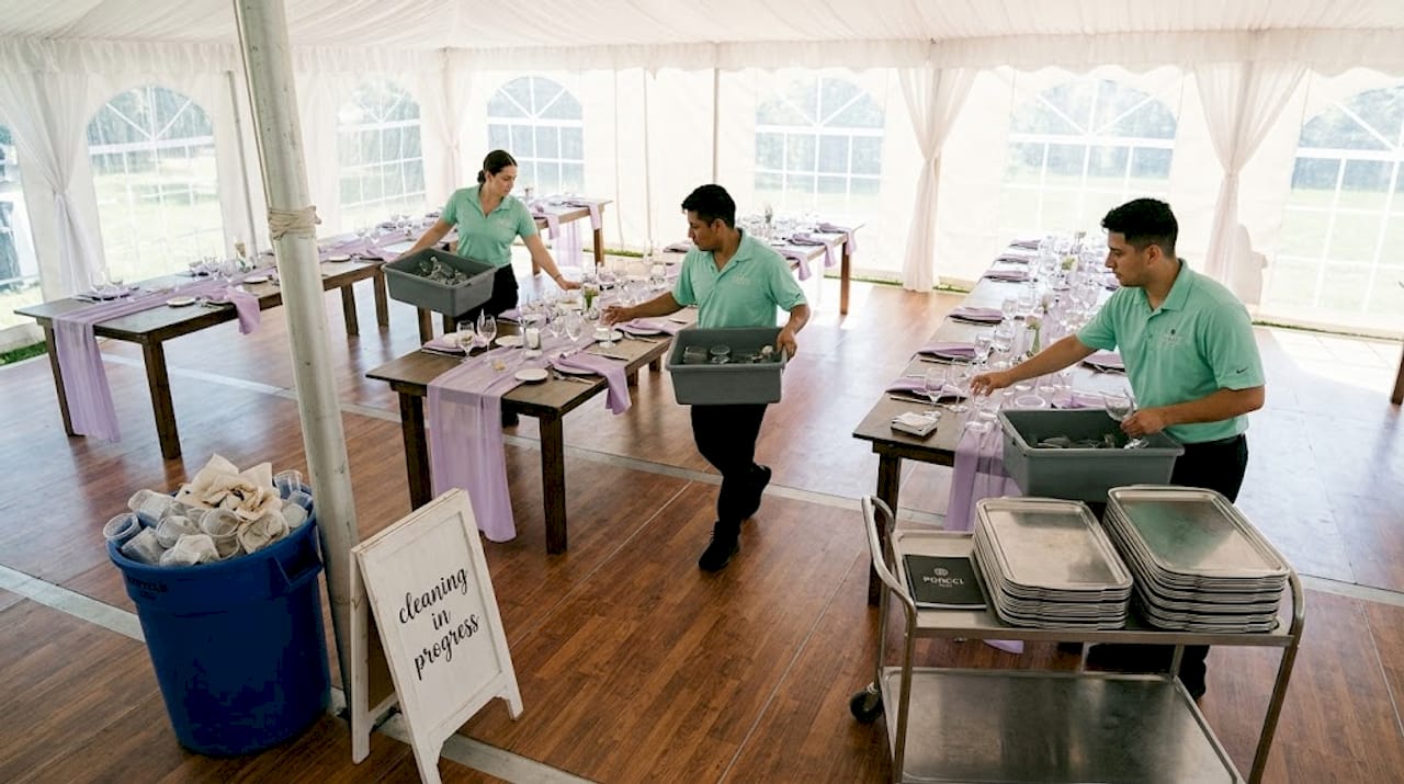 Crew cleaning after event breakdown