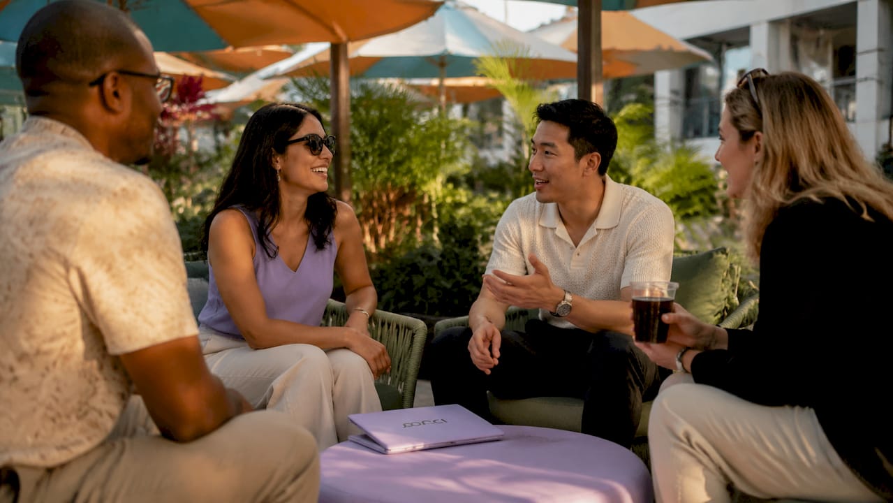 Attendees networking in adaptable lounge area