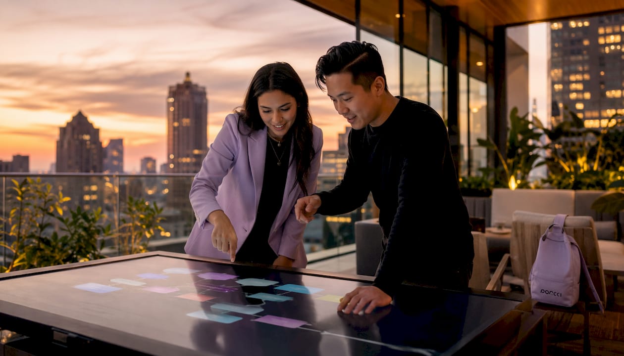 Two event planners collaborating with digital workflow