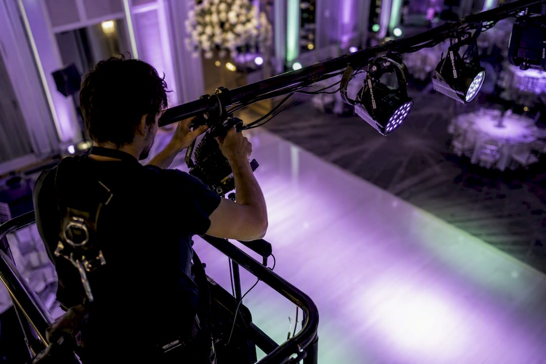 Lighting technician adjusting dance floor lights