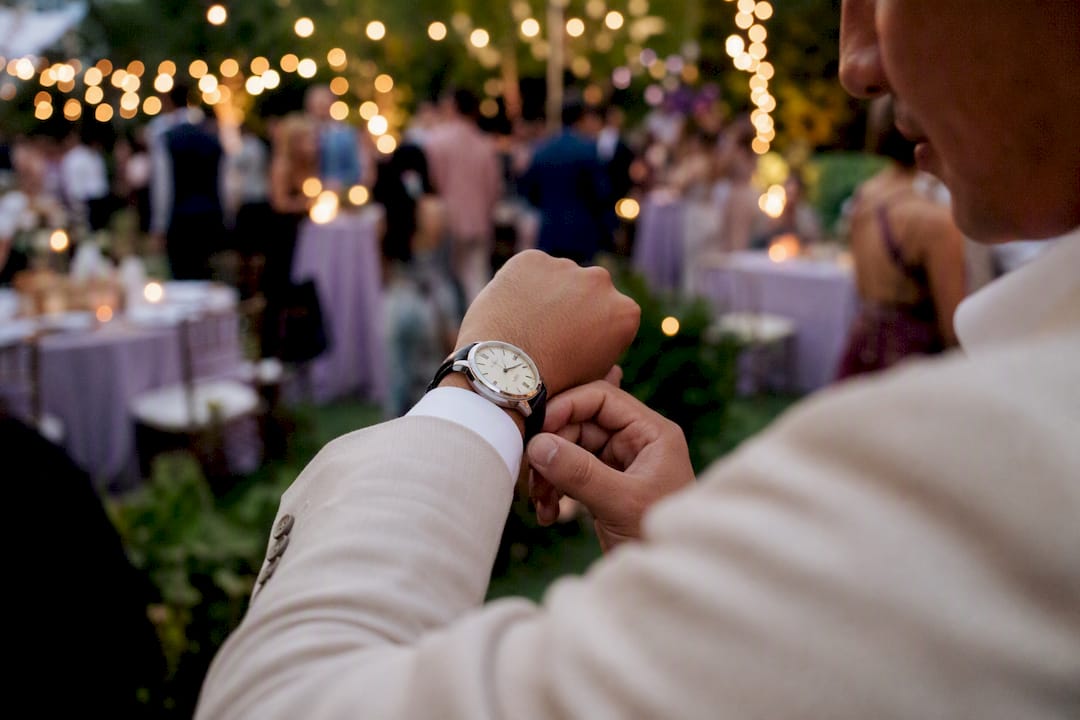 Close-up wristwatch showing time at wedding