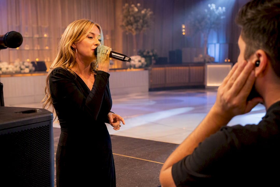 Vocalist performing wedding reception sound check