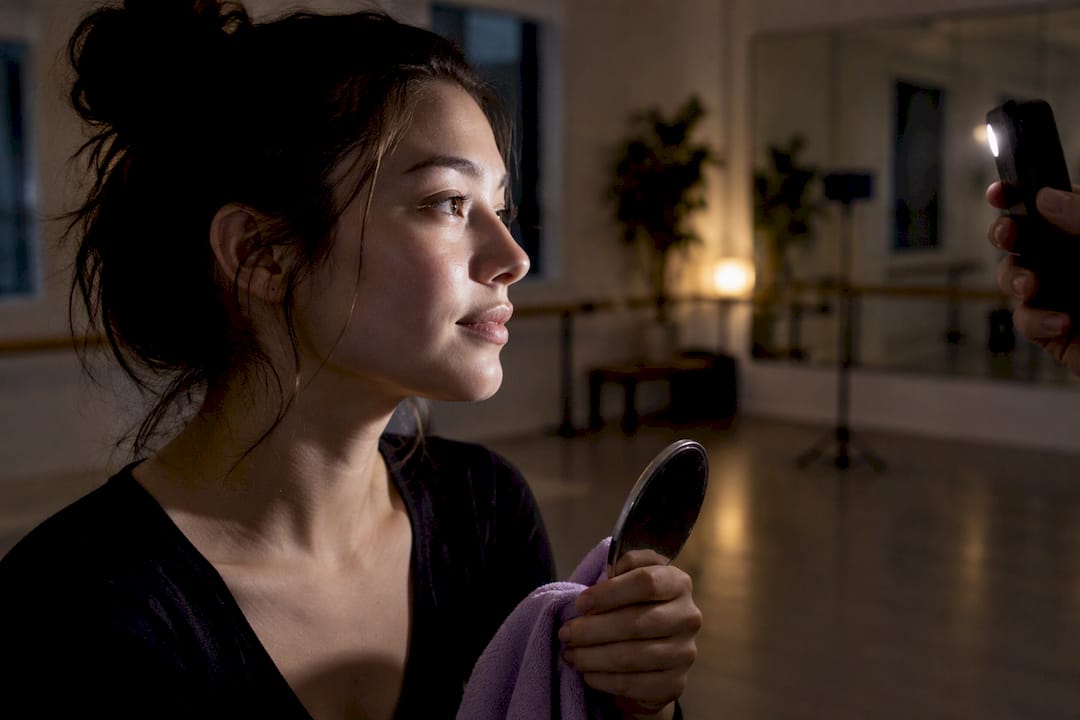 Phone flashlight testing side light on face