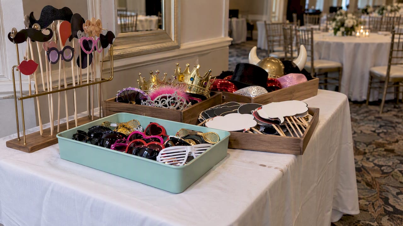 Photo booth props sorted in accessible trays