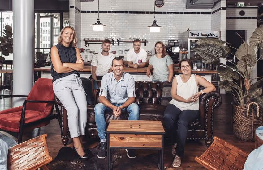 team picture on couch