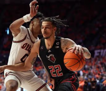Two men playing basketball