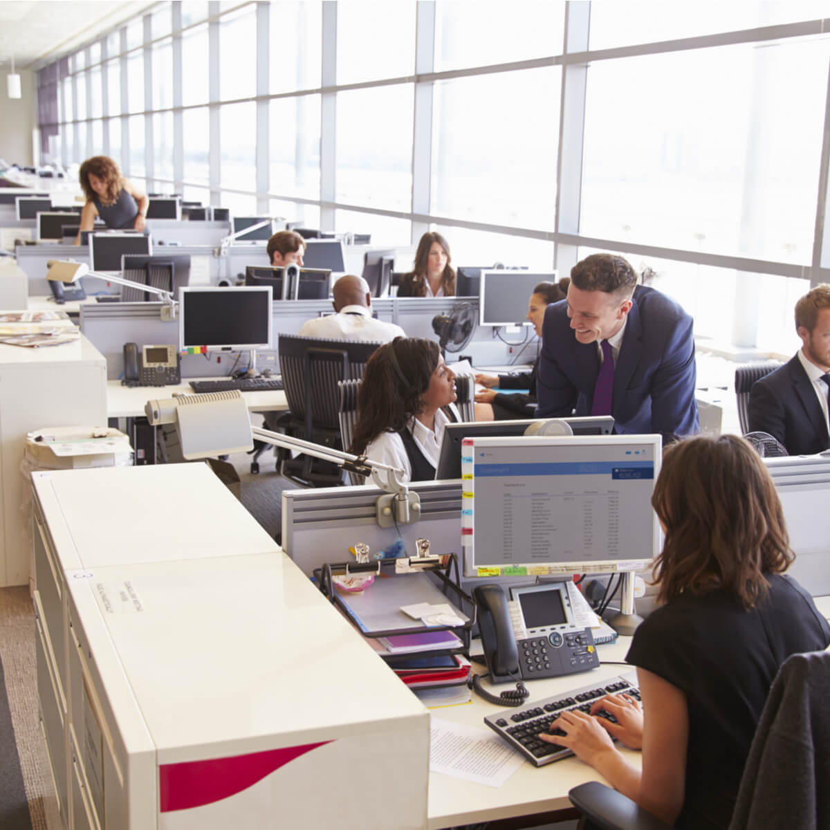 Office team handling data processing and data entry tasks for accurate business support services