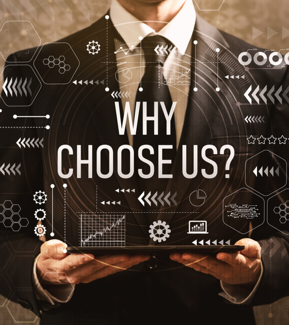 A businessman holding a tablet with digital graphics and the text “Why Choose Us?” displayed, representing business decision-making and value proposition.
