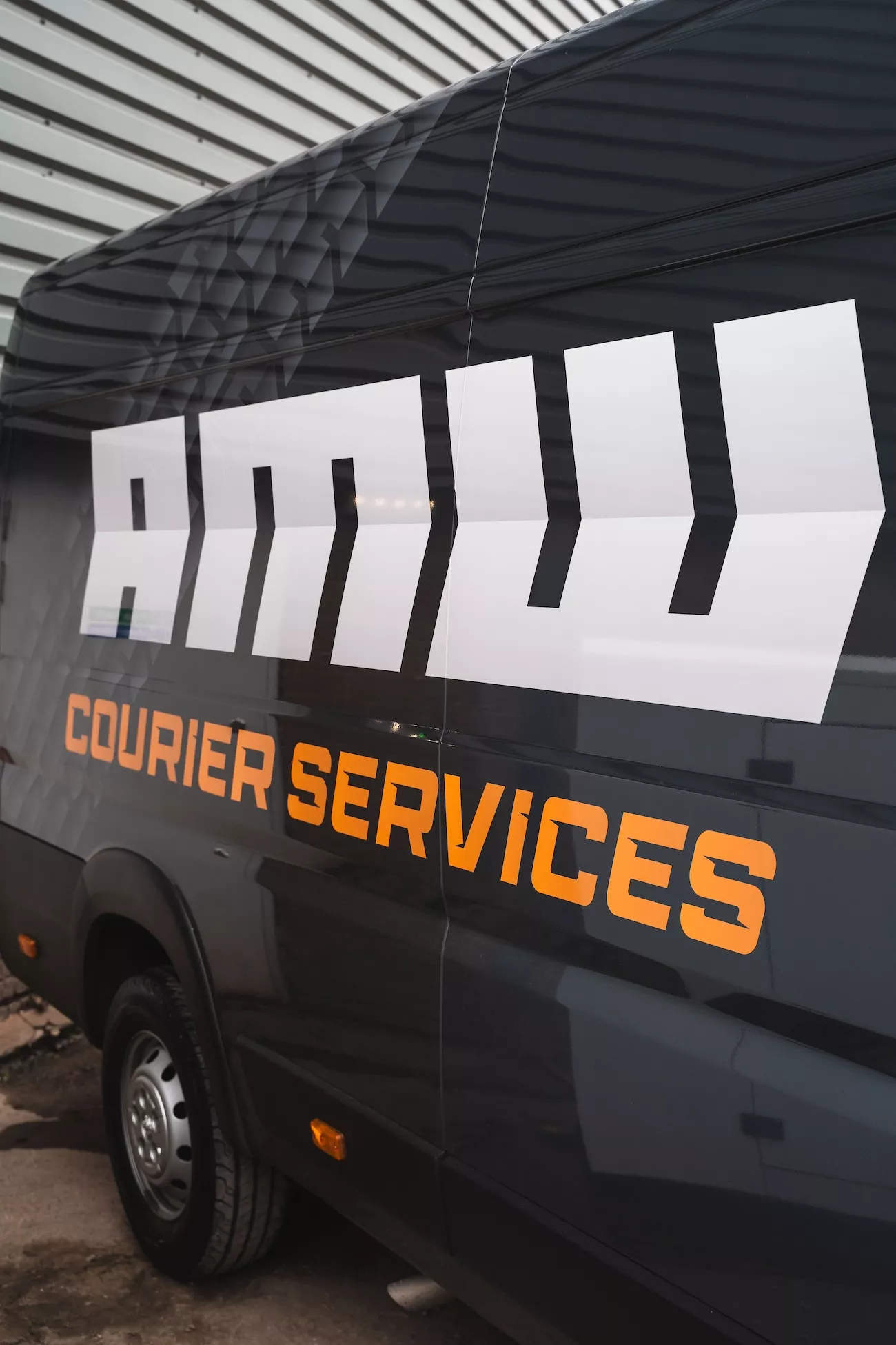 AMW Couriers branded delivery van representing specialist courier services across the UK