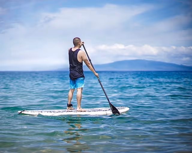 Paddle boarding in Maui ocean Photo courtesy @madxiii