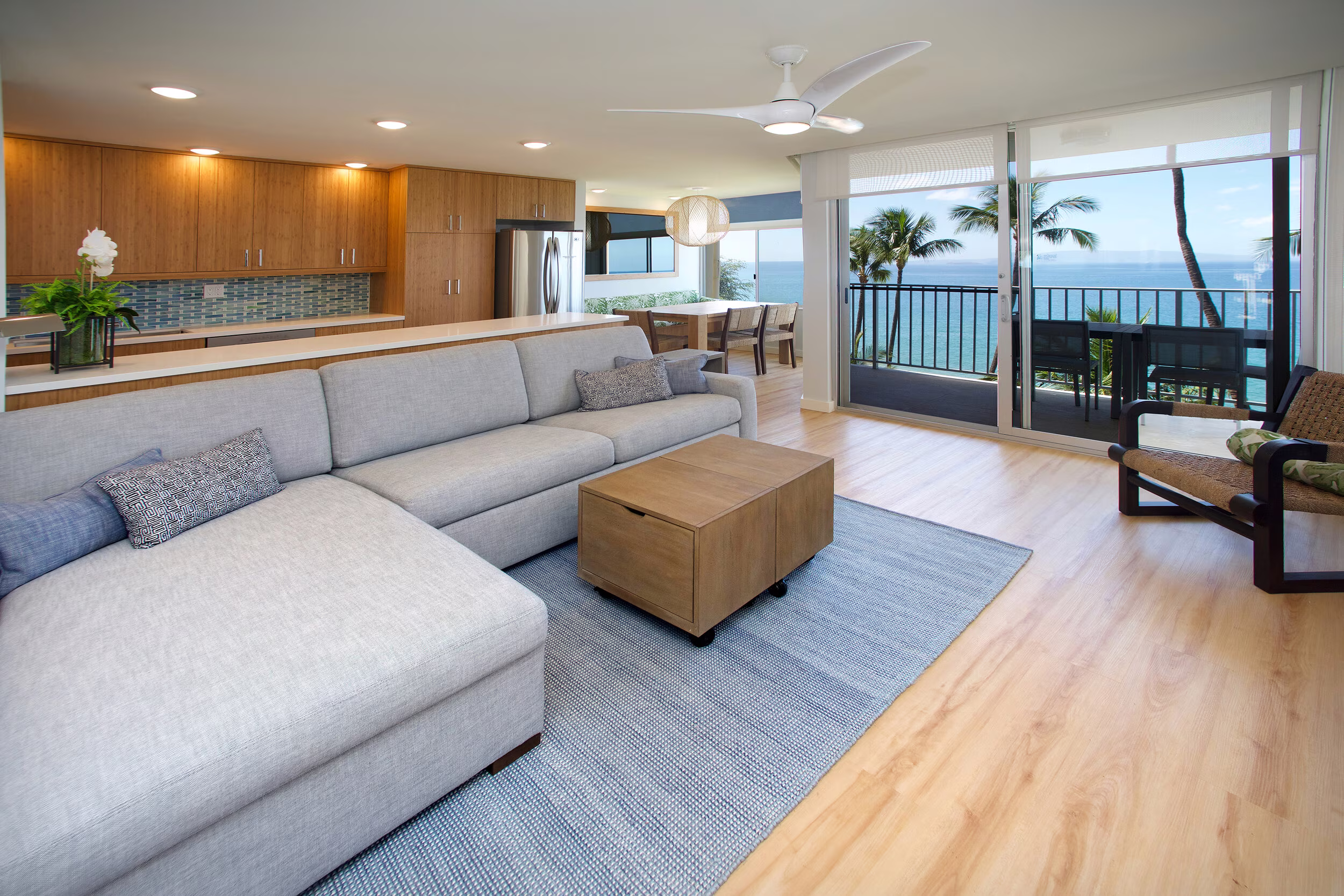 Premium oceanfront condo living room with ocean view lanai at The Hale Pau Hana